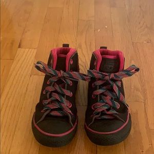 Pink and black kids converse